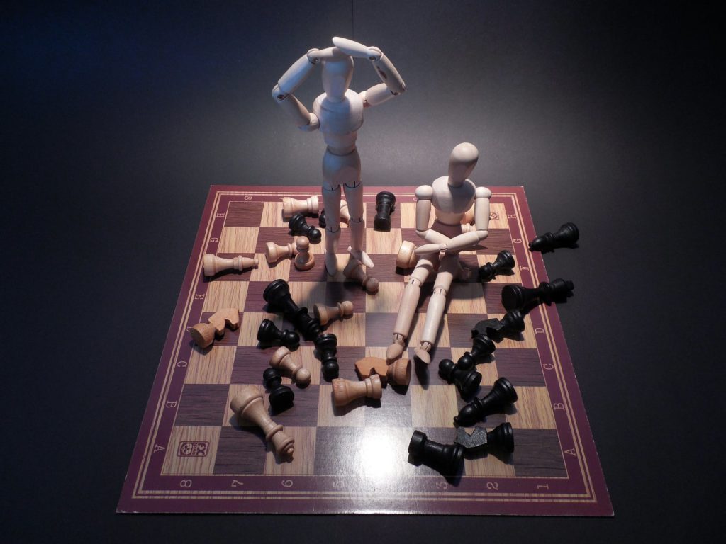 Chess board knocked over representing the mistakes that must be avoided when starting a business from home